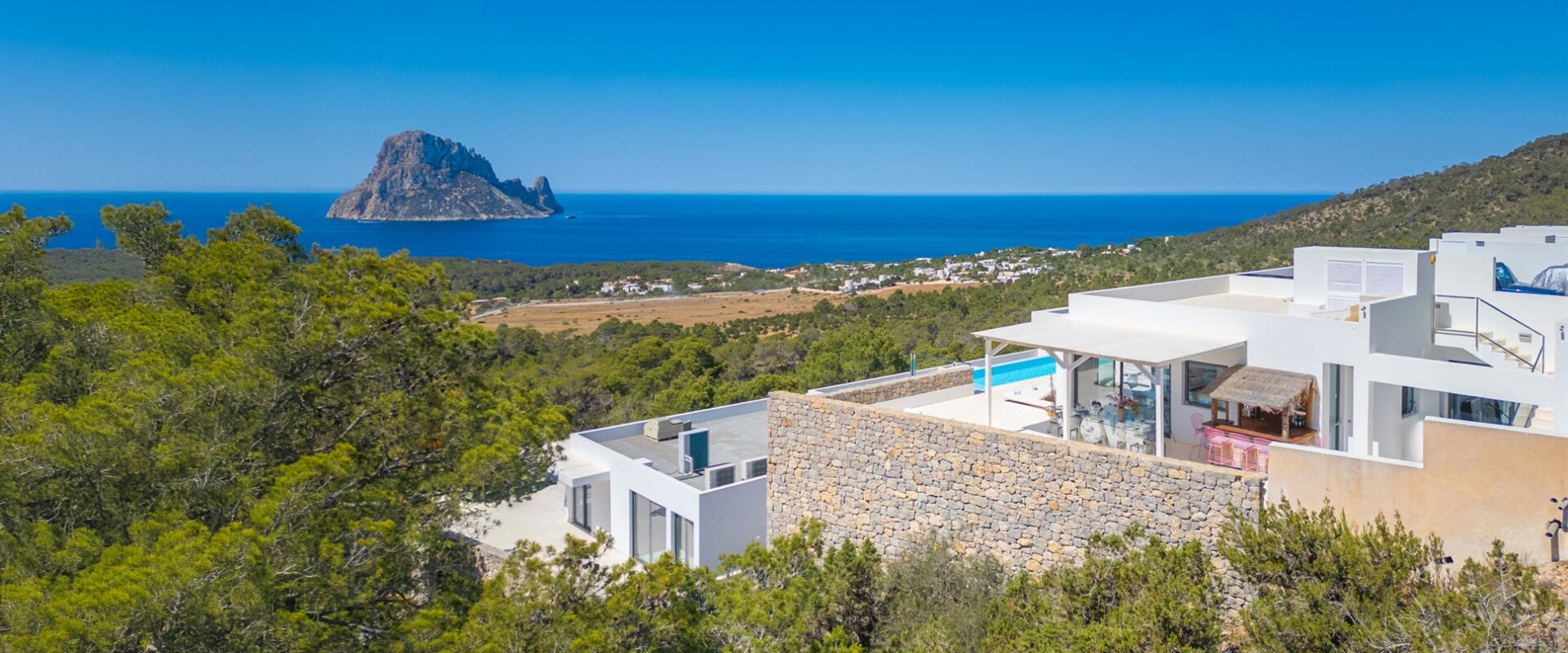 Spacious 5-Bedroom Townhouse in Cala Carbo with Infinity Pool and Es Vedrà Views