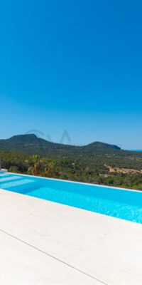 Maison de ville à Cala Carbo avec piscine à débordement et vue sur Es Vedrà