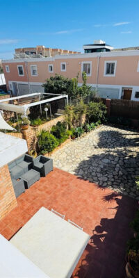 Elegant Triplex Townhouse with Private Garden in Es Vivé Elegant Triplex Townhouse with Private Garden in Es Vivé