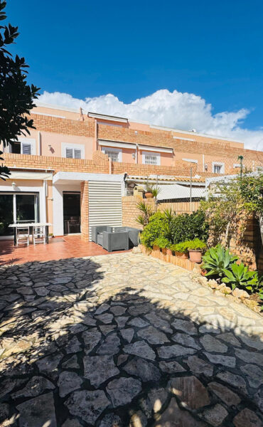 Elegant Triplex Townhouse with Private Garden in Es Vivé